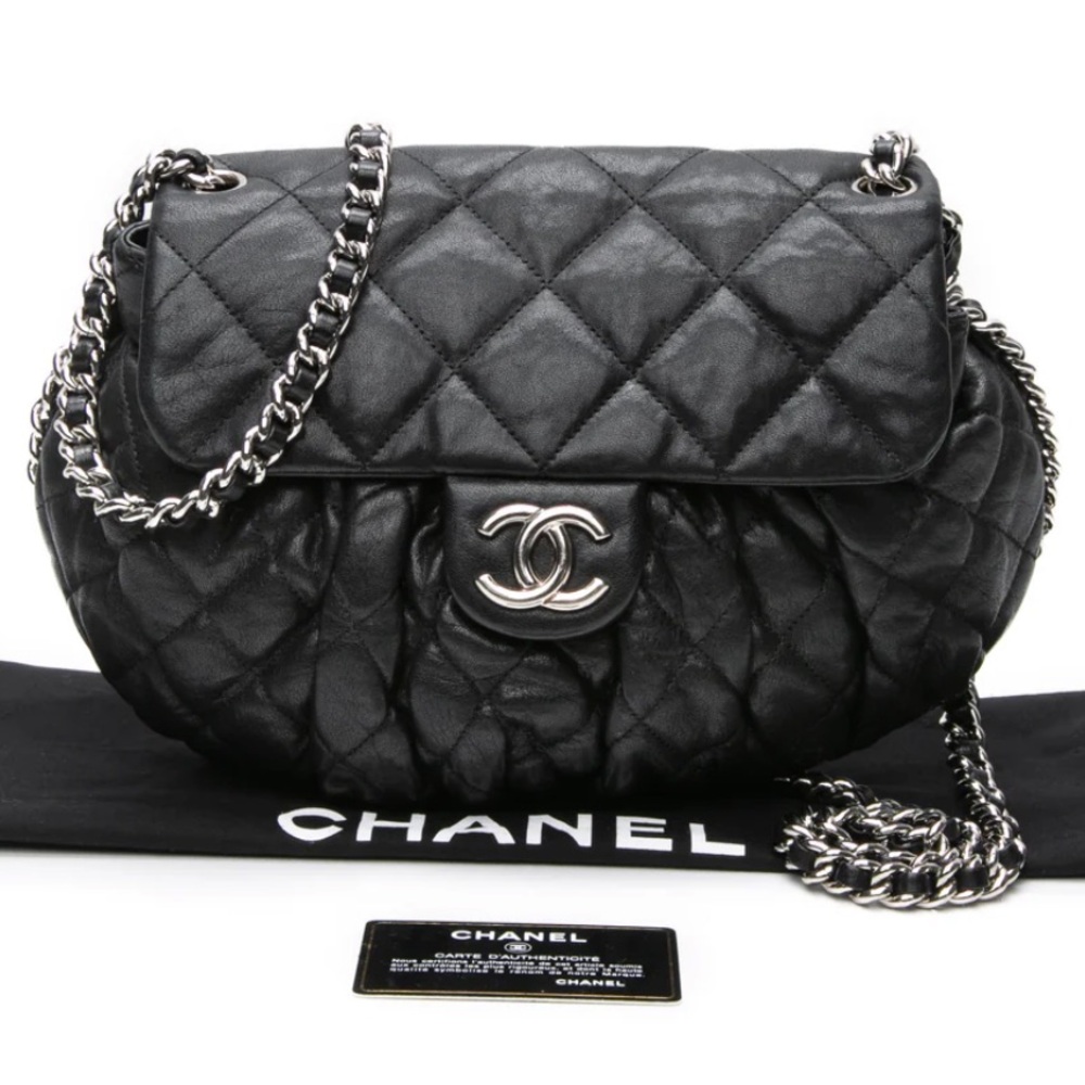 Authentic Chanel Black Quilted Crossbody Bag with Silver Chain